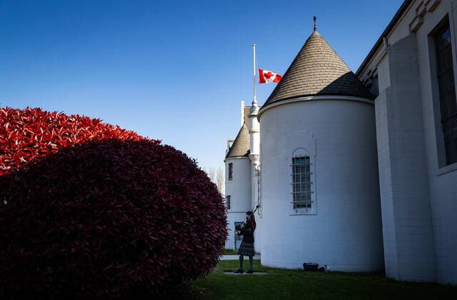 April 17, 2021, Vancouver, BC, Canada: Pipe Major Dan Bell warms up before playing the piper s lament in honour of Britain s Prince Philip as the Canadian flag flies at half mast outside The Seaforth Highlanders of Canada armoury, in Vancouver, on Saturday, April 17, 2021. Prince Philip was the Colonel-in-Chief of The Seaforth Highlanders of Canada, an Army Reserve infantry regiment of 39 Canadian Brigade Group garrisoned in Vancouver. Vancouver Canada  - ZUMAc35_ 20210417_zaf_c35_040 Copyright: xDarrylxDyckx
