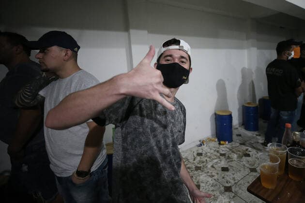 April 18, 2021, Sao Paulo, Sao Paulo, Brazil: Police officers dispersed an illegal and clandestine party in Sao Paulo in the early hours of Sunday, 18. About 150 people were in place, most without a face shield, drinking and smoking hookah, disregarding the health conditions and failing to comply with the quarantine against Covid-19. Sao Paulo Brazil - ZUMAl146 20210418_zaf_l146_016 Copyright: xPauloxLopesx