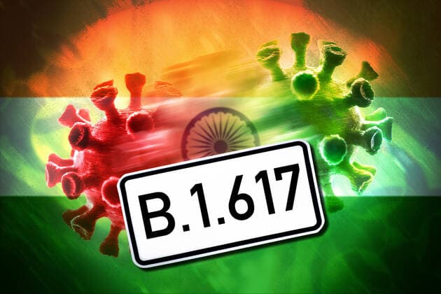 PHOTOMONTAGE, Mutating coronavirus and flag of India, symbol photo Indian virus mutation B 1 617 ** NUR FUER REDAKTIONELLE ZWECKE ** EDITORIAL USE ONLY **