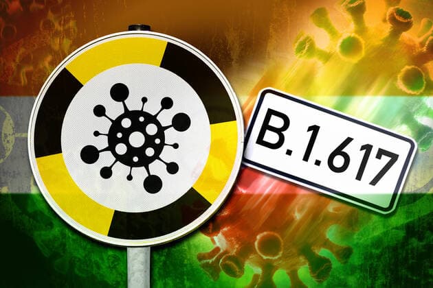 PHOTOMONTAGE, Coronavirus warning sign and flag of India, symbol photo Indian virus mutation B 1 617 ** NUR FUER REDAKTIONELLE ZWECKE ** EDITORIAL USE ONLY **
