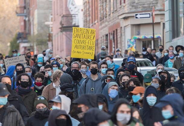April 18, 2021, Montreal, PQ, Canada: People take part in a demonstration opposing the Quebec governmentÃ¢â‚¬â ¢s 8pm curfew in Montreal, Sunday, April 18, 2021, as the COVID-19 pandemic continues in Canada and around the world. Montreal Canada  - ZUMAc35_ 20210418_zaf_c35_033 Copyright: xGrahamxHughesx