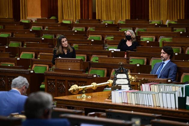 April 19, 2021, Ottawa, on, Canada: Finance Minister Chrystia Freeland delivers the federal budget in the House of Commons as Prime Minister Justin Trudeau, right, looks on in Ottawa on Monday April 19, 2021. The federal government unveiled spending plans to manage the remainder of the COVID-19 crisis and chart an economic course for a post-pandemic Canada. Ottawa Canada  - ZUMAc35_ 20210419_zaf_c35_096 Copyright: xSeanxKilpatrickx