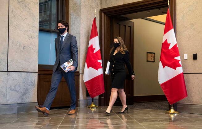 April 19, 2021, Ottawa, on, Canada: Prime Minister Justin Trudeau, left, arrives with Deputy Prime Minister and Minister of Finance Chrystia Freeland as she prepares to table the federal budget in the House of Commons in Ottawa, on Monday, April 19, 2021. Ottawa Canada  - ZUMAc35_ 20210419_zaf_c35_107 Copyright: xJustinxTangx