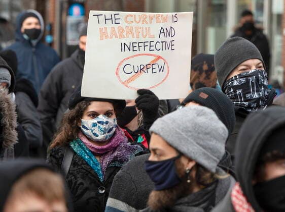 April 22, 2021, Montreal, PQ, Canada: People march in an anti-COVID-curfew protest Thursday, April 22, 2021 in Montreal. Montreal Canada  - ZUMAc35_ 20210422_zaf_c35_056 Copyright: xRyanxRemiorzx