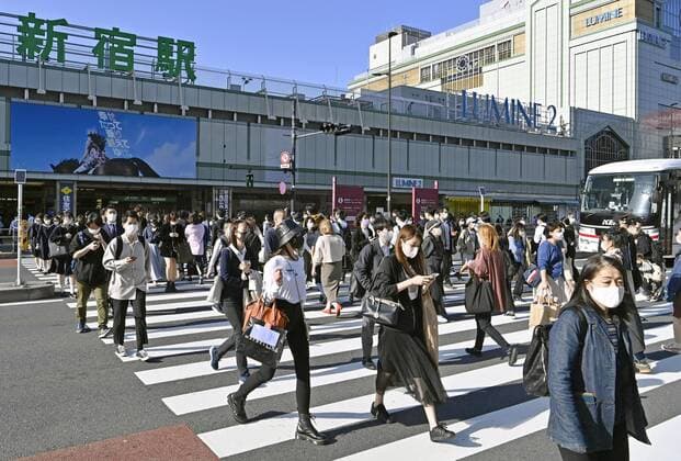 COVID-19 state of emergency declared for Tokyo, Osaka region People wearing face masks walk in Tokyo s Shinjuku area on April 23, 2021. Prime Minister Yoshihide Suga declared a state of emergency the same day in Tokyo and the western Japan prefectures of Osaka, Kyoto and Hyogo amid a rapid resurgence of coronavirus infections. 
