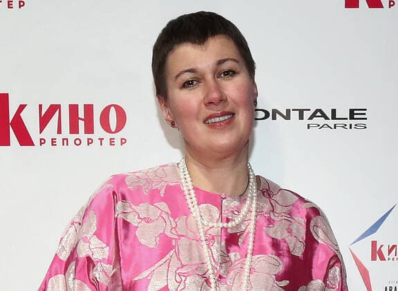 MOSCOW, RUSSIA - APRIL 23, 2021: Producer Natalya Mokritskaya poses for a photograph as she arrives for an Avans award ceremony at the 43rd Moscow International Film Festival. Avans is an award presented annually by Kinoreporter magazine to young film actors. Valery Sharifulin TASS  TS0FDE12