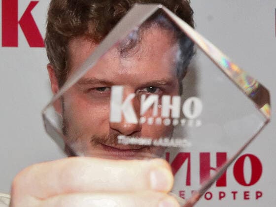 MOSCOW, RUSSIA - APRIL 23, 2021: Actor Tikhon Zhiznevsky receives an Avans award at a ceremony at the 43rd Moscow International Film Festival. Avans is an award presented annually by Kinoreporter magazine to young film actors. Valery Sharifulin TASS  TS0FDE2A