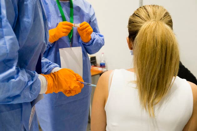April 23, 2021, Timisoara, Timis, Romania: Woman receives anti-COVID vaccine produced by Pfizer, without any previous appointment, as part of the Vaccination Marathon, at a round-the-clock vaccination center. Timisoara Romania - ZUMAp180 20210423_zip_p180_005 Copyright: xCornelxPutanx