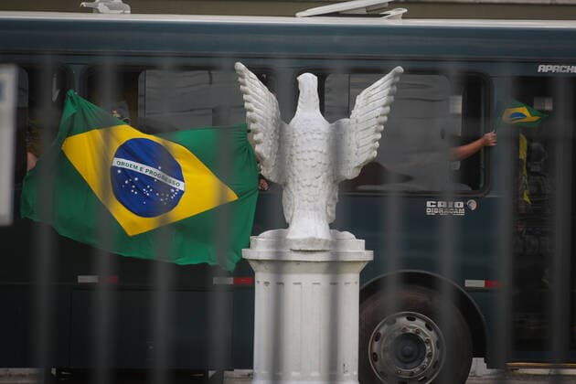 BELÉM, PA - 23.04.2021: BOLSONARO ENTREGA ALIMENTOS EM BELÉM - President Jair Bolsonaro (without a party) delivers food this Friday (23) in Belém do Pará. The event takes place at Belém Air Force Base and is part of the Brasil Fraterno initiative, which aims to serve needy families in regions of social crisis. Supporters of President Bolsonaro threaten journalists in front of the venue. x2057156x  FilipexBispo