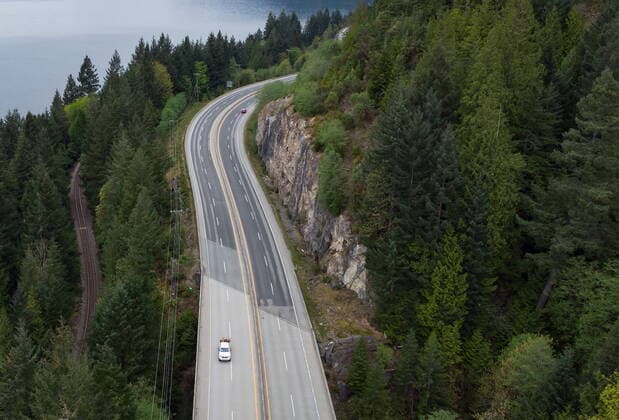 April 23, 2021, Lions Bay, BC, Canada: Motorists travel on the Sea-to-Sky highway between Horseshoe Bay and Lions Bay, B.C., on Friday, April 23, 2021. Non-essential travel is being restricted between three regional zones in British Columbia to try and curb the spread of COVID-19. Lions Bay Canada  - ZUMAc35_ 20210423_zaf_c35_087 Copyright: xDarrylxDyckx