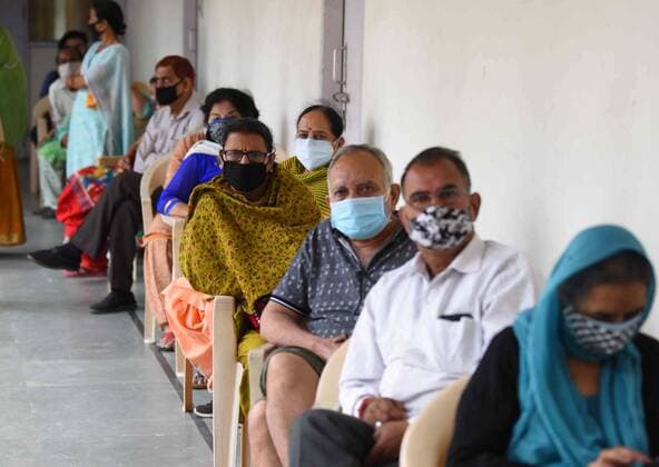 CHANDIGARH, INDIA - APRIl 23: Residents wait for their turn get vaccinated against Covid-19 at a Community Centre in Sector 23, on April 23, 2021 in Chandigarh, India. (Photo by Keshav Singh Hindustan Times) 4th Phase Of Covid-19 Vaccination