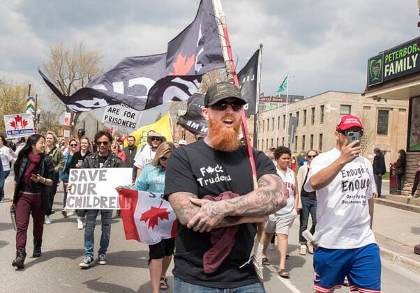 April 24, 2021, Peterborough, on, Canada: Demonstrators march at a protest against government measures to curb the spread of COVID-19, in Peterborough, Ont., Saturday, April 24, 2021. Peterborough Canada  - ZUMAc35_ 20210424_zaf_c35_021 Copyright: xFredxThornhillx