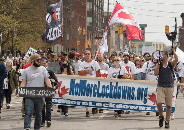 April 24, 2021, Peterborough, on, Canada: Demonstrators march at a protest against government measures to curb the spread of COVID-19, in Peterborough, Ont., Saturday, April 24, 2021. Peterborough Canada  - ZUMAc35_ 20210424_zaf_c35_024 Copyright: xFredxThornhillx