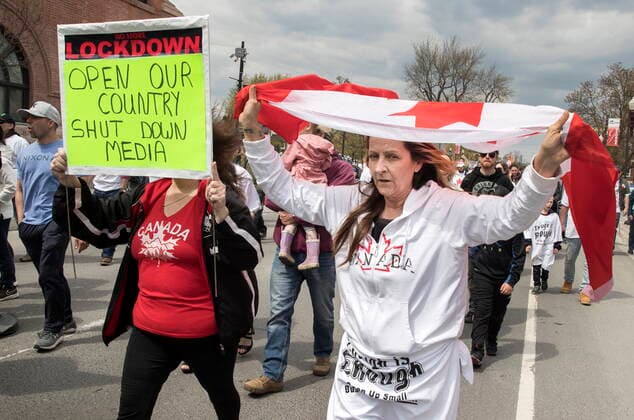 April 24, 2021, Peterborough, on, Canada: Demonstrators march at a protest against government measures to curb the spread of COVID-19, in Peterborough, Ont., Saturday, April 24, 2021. Peterborough Canada  - ZUMAc35_ 20210424_zaf_c35_029 Copyright: xFredxThornhillx