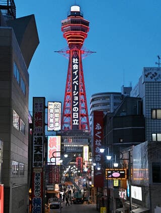 Tsutenkaku Tower is seen lit up in red as Osaka prefecture COVID-19 alarmed emergency in Osaka, Japan on April 25, 2021. Tokyo,Osaka, Kyoto and Hyogo prefectures entered a new state of emergency for COVID-19 on April 25 through May 11.  TKP2021042520 KEIZOxMORI