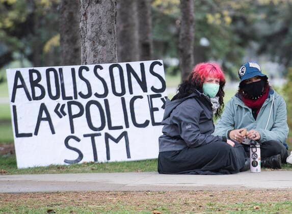 April 25, 2021, Montreal, PQ, Canada: People take part in a demonstration against police brutality in Montreal, Sunday, April 25, 2021. Montreal Canada  - ZUMAc35_ 20210425_zaf_c35_011 Copyright: xGrahamxHughesx
