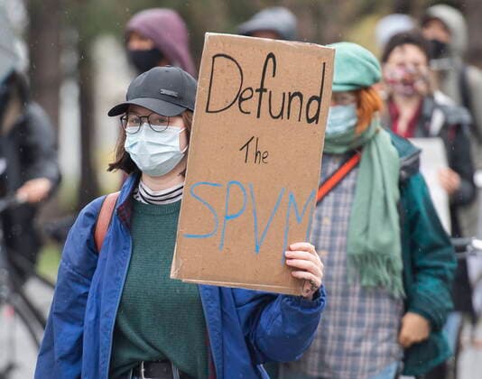 April 25, 2021, Montreal, PQ, Canada: People take part in a demonstration against police brutality in Montreal, Sunday, April 25, 2021. Montreal Canada  - ZUMAc35_ 20210425_zaf_c35_014 Copyright: xGrahamxHughesx