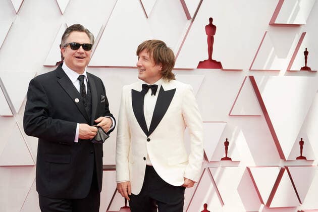 OscarÂ® nominee Daniel Pemberton (R) and guest arrive on the red carpet of The 93rd OscarsÂ® at Union Station in Los Angeles, CA on Sunday, April 25, 2021. Los Angeles CA USA  Copyright: xMattxPetitx 34135063THA