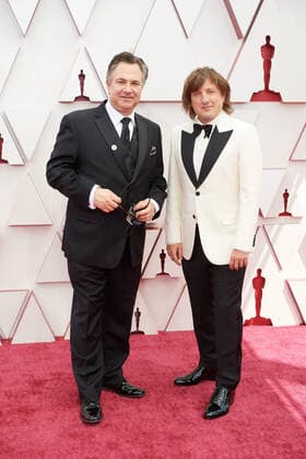 OscarÂ® nominee Daniel Pemberton (R) and guest arrive on the red carpet of The 93rd OscarsÂ® at Union Station in Los Angeles, CA on Sunday, April 25, 2021. Los Angeles CA USA  Copyright: xMattxPetitx 34135064THA