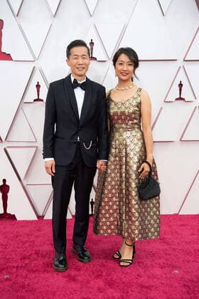 OscarÂ® nominee Lee Issac Chung and guest arrive on the red carpet of The 93rd OscarsÂ® at Union Station in Los Angeles, CA on Sunday, April 25, 2021. Los Angeles CA USA  Copyright: xMattxPetitx 34135074THA