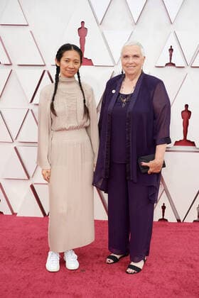 OscarÂ® nominee ChloÃ Zhao and guest arrive on the red carpet of The 93rd OscarsÂ® at Union Station in Los Angeles, CA on Sunday, April 25, 2021. Los Angeles CA USA  Copyright: xMattxPetitx 34135118THA