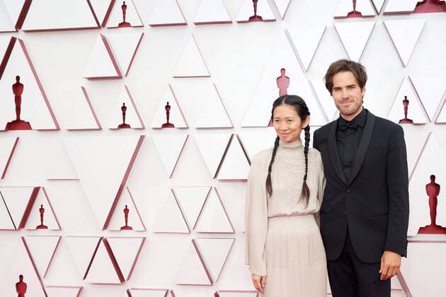OscarÂ® nominees ChloÃ Zhao and Joshua James Richards arrive on the red carpet of The 93rd OscarsÂ® at Union Station in Los Angeles, CA on Sunday, April 25, 2021. Los Angeles CA USA  Copyright: xMattxPetitx 34135146THA