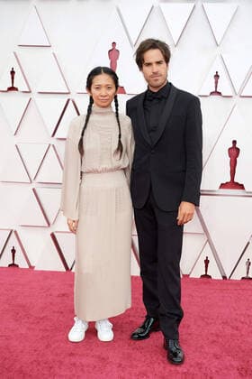 OscarÂ® nominees ChloÃ Zhao and Joshua James Richards arrive on the red carpet of The 93rd OscarsÂ® at Union Station in Los Angeles, CA on Sunday, April 25, 2021. Los Angeles CA USA  Copyright: xMattxPetitx 34135145THA