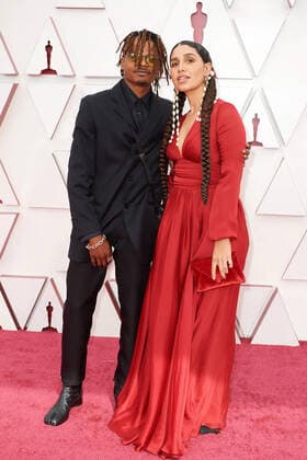 OscarÂ® nominee Garrett Bradley (R) and guest arrive on the red carpet of The 93rd OscarsÂ® at Union Station in Los Angeles, CA on Sunday, April 25, 2021. Los Angeles CA USA  Copyright: xMattxPetitx 34135317THA