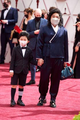 OscarÂ® nominee Christina Oh arrives with Alan Kim on the red carpet of The 93rd OscarsÂ® at Union Station in Los Angeles, CA on Sunday, April 25, 2021. Los Angeles CA USA  Copyright: xMattxPetitx 34135455THA