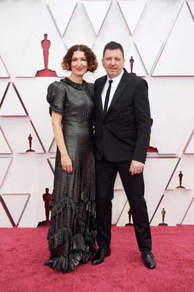 OscarÂ® nominee Atticus Ross arrives with Claudia Sarne on the red carpet of The 93rd OscarsÂ® at Union Station in Los Angeles, CA on Sunday, April 25, 2021. Los Angeles CA USA  Copyright: xMattxPetitx 34135499THA