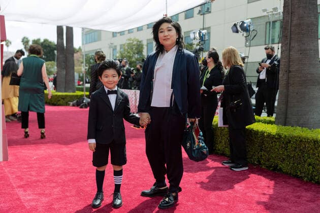 OscarÂ® nominee Christina Oh (R) arrives with Alan Kim on the red carpet of The 93rd OscarsÂ® at Union Station in Los Angeles, CA on Sunday, April 25, 2021. Los Angeles CA USA  Copyright: xMattxSaylesx 34135579THA