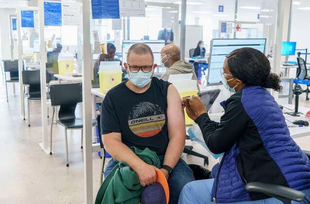 April 26, 2021, Montreal, PQ, Canada: An employee is vaccinated at a COVID-19 vaccination clinic at CAE headquarters in Montreal, on Monday, April 26, 2021. A provincial program to provide vaccinations at large businesses began today at the Montreal headquarters of the flight simulation technology manufacturer. Montreal Canada  - ZUMAc35_ 20210426_zaf_c35_058 Copyright: xPaulxChiassonx