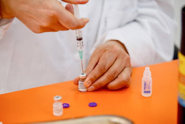 April 27, 2021, Tunis, Tunisia: A medical worker prepares a dose of the Pfizer-BioNTech COVID-19 vaccine at Ariana Youth Center as vaccination centers across the country experience an influx of registrations during Ramadan. Tunis Tunisia - ZUMAs197 20210427_zaa_s197_031 Copyright: xJdidixWassimx