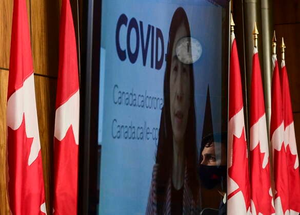 April 27, 2021, Ottawa, on, Canada: Prime Minister Justin Trudeau is reflected in a monitor as Chief Public Health Officer Dr. Theresa Tam talks virtually during a press conference in Ottawa on Tuesday, April 27, 2021, during the COVID-19 pandemic. Ottawa Canada  - ZUMAc35_ 20210427_zaf_c35_017 Copyright: xSeanxKilpatrickx