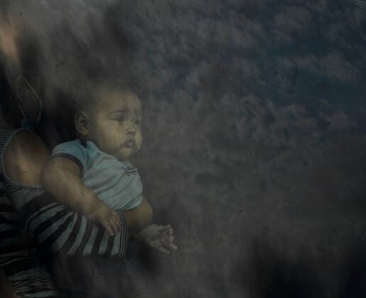 April 27, 2021, La Joya, Texas, USA: Asylum-seeking migrants are processed after crossing border from Mexico in La Joya TX on April 27, 2021. A surge has been overwhelming U.S. facilities at the southern borders. La Joya USA - ZUMAg208 20210427_zap_g208_016 Copyright: xCarolxGuzyx