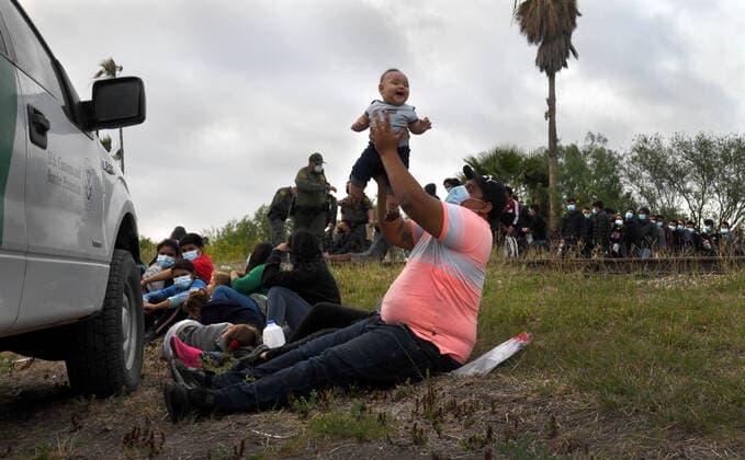 April 27, 2021, La Joya, Texas, USA: Asylum-seeking migrants are processed after crossing border from Mexico in La Joya. A surge has been overwhelming U.S. facilities at the southern borders. La Joya USA - ZUMAg208 20210427_zap_g208_002 Copyright: xCarolxGuzyx