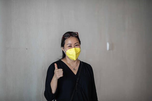 April 28, 2021, Tangerang Selatan, Banten, Indonesia: South Tangerang, Banten, Indonesia, 28 April 2021 :A woman show his thumb after vaccination. Vaccination for teachers and elderly at South Tangerang, Banten, Indonesia. Indonesia in pushing for coverage vaccination in 2021 to have communal immune, while variant covid19 mutated already hit India like tsunami wave. Tangerang Selatan Indonesia - ZUMAh128 20210428_zap_h128_008 Copyright: xDonalxHusnix