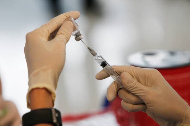 April 28, 2021, Bangkok, Thailand: A health worker prepares a dose of the CoronaVac (Sinovac) vaccine at Suvarnabhumi airport..The CoronaVac (Sinovac) vaccine is Chinese-made and developed by Sinovac Life Sciences..Ministry of Public Health and the Airport Operation Centre set up a new vaccination centre to remedy the Covid 19 emergency situation and efficiency of vaccination for aviation-related personnel. Bangkok Thailand - ZUMAs197 20210428_zaa_s197_030 Copyright: xChaiwatxSubprasomx