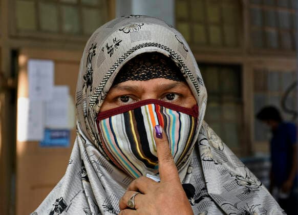 India: 8th Phase of Polling at West Bengal A voter showing Mark in her finger after cast her vote in Kolkata, West Bengal Kolkata India Copyright: SuraranjanxNandi