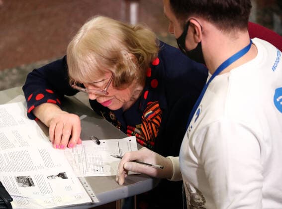 MOSCOW, RUSSIA â€“ APRIL 29, 2021: A woman takes a history competence test on World War II, Victory Dictation, at the Victory Museum on Poklonnaya Hill. Mikhail Tereshchenko TASS  TS0FE786