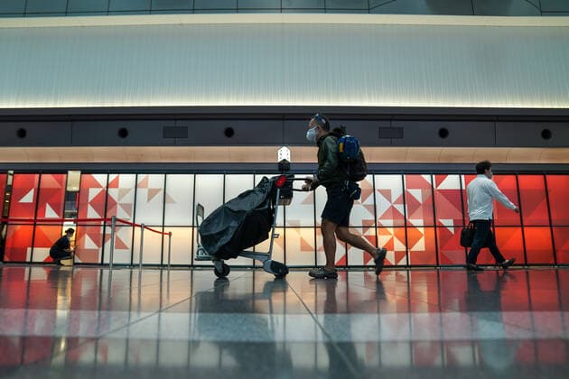 (210429) -- TOKYO, April 29, 2021 -- People are seen at Haneda Airport during the start of Japan s Golden Week in Tokyo, Japan, April 29, 2021. The Japanese government imposed a state of emergency until May 11 in Tokyo, Osaka, Kyoto and Hyogo, which is aimed at curbing a surge in COVID-19 cases during the Golden Week holidays. (Photo by Xinhua) JAPAN-GOLDEN WEEK-COVID-19-STATE OF EMERGENCY ChristopherxJue 