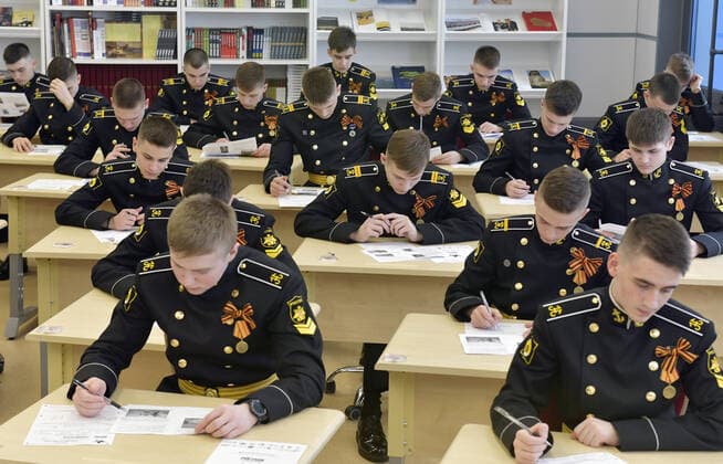 MURMANSK, RUSSIA â€“ APRIL 29, 2021: Cadets take a history competence test on World War II, Victory Dictation, at Murmansk Nakhimov Naval School. Lev Fedoseyev TASS  TS0FE7FA