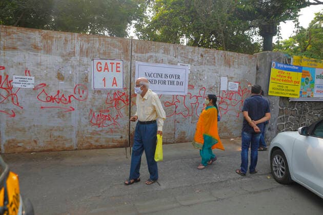 April 29, 2021, Mumbai, Maharshtra, INDIA: 29 April 2021 - Mumbai - INDIA.Disappointed Citizens who came to get vaccinated read NOTICE board about No Vaccine Stocks Available at the NESCO Jumbo Covid Vaccination centre which has run out of Vaccine Stocks... NO VACCINE STOCK AVAILABLE Sign boards were seen across many Covid vaccination centers in India...India suffers vaccine shortages as virus surges.Vaccination centers in many parts of India, including Mumbai, turn people away and large parts of the country reportedly run low on vaccine doses, just as infections increase at their fastest rate since the covid 19 pandemic began last year.Critics are claiming that India should first take care of it s domestic vaccination needs before it e - ZUMAsu5_ 20210429_zap_su5_007 Copyright: xSubhashxSharmax