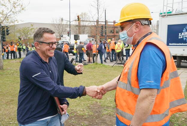 April 29, 2021, Montreal, PQ, Canada: Michel Murray, spokesman with the Canadian Union of Public Employees, greets a striking Port of Montreal dockworker during a rally in Montreal on Thursday, April 29, 2021. Montreal Canada  - ZUMAc35_ 20210429_zaf_c35_071 Copyright: xPaulxChiassonx