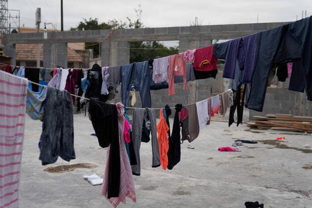 April 29, 2021, Reynosa, Mexico: Laundry hangs to dry in a building under construction. Asylum seeking migrants from Central America are living on the street in Reynosa, Mexico while they wait for President Joe Biden to open the US border for them to try to cross. Reynosa Mexico - ZUMAd211 20210429_zap_d211_006 Copyright: xAllisonxDinnerx