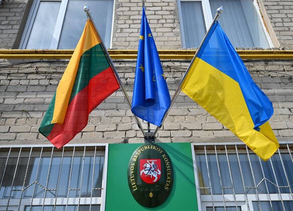 SIEVIERODONETSK, UKRAINE - APRIL 30, 2021 - The flags of Lithuania, the European Union and Ukraine (L to R) are seen on the building housing the Honorary Consulate of the Republic of Lithuania that has been opened in Sievierodonetsk, Luhansk Region, eastern Ukraine. Honorary Consulate of Lithuania in Luhansk Region  Copyright: xOleksiixKovalovx