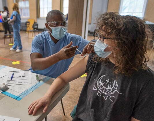 April 30, 2021, Montreal, PQ, Canada: Hannah Claus, who is Mohawk, gets the Pfizer COVID-19 vaccination at a mobile clinic for members of First Nations and their partners Friday, April 30, 2021 in Montreal. Montreal Canada  - ZUMAc35_ 20210430_zaf_c35_001 Copyright: xRyanxRemiorzx