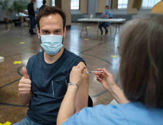 April 30, 2021, Montreal, PQ, Canada: Yannick Savard reacts as he gets the COVID-19 vaccination at a mobile clinic for members of First Nations and their partners, in Montreal, Friday, April 30, 2021. Montreal Canada  - ZUMAc35_ 20210430_zaf_c35_017 Copyright: xRyanxRemiorzx
