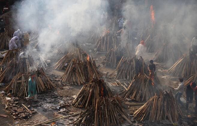 May 1, 2021, New Delhi, New Delhi, India: Covid 19 victims being cremated at Gazipur crematorium on May 1, 2021 in New Delhi, India..As many as 4,01,993 more people tested positive for Covid-19 in the last 24 hours, taking the cumulative caseload to 1,91,64,969, said the Union health ministry on Saturday. This is the highest number of new infections ever recorded in a day across the globe. New Delhi India - ZUMAp176 20210501_zip_p176_008 Copyright: xVijayxPandeyx