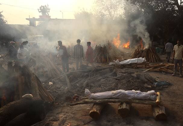 May 1, 2021, New Delhi, New Delhi, India: Covid 19 victims being cremated at Gazipur crematorium on May 1, 2021 in New Delhi, India..As many as 4,01,993 more people tested positive for Covid-19 in the last 24 hours, taking the cumulative caseload to 1,91,64,969, said the Union health ministry on Saturday. This is the highest number of new infections ever recorded in a day across the globe. New Delhi India - ZUMAp176 20210501_zip_p176_015 Copyright: xVijayxPandeyx